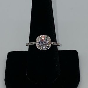 Cocktail ring with simulated center diamond & halo